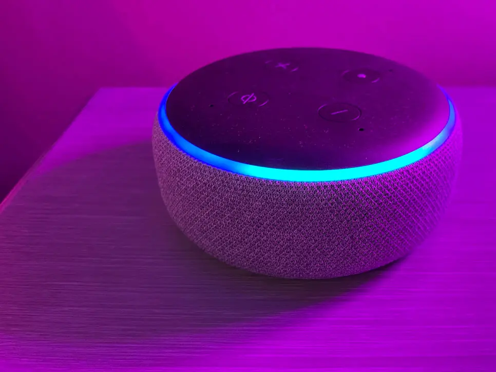 Voice Search being used on Alexa, it lights up in a purple room