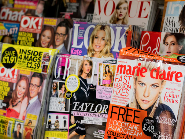 A row of consumer magazines in a shop which are targeted by digital PR